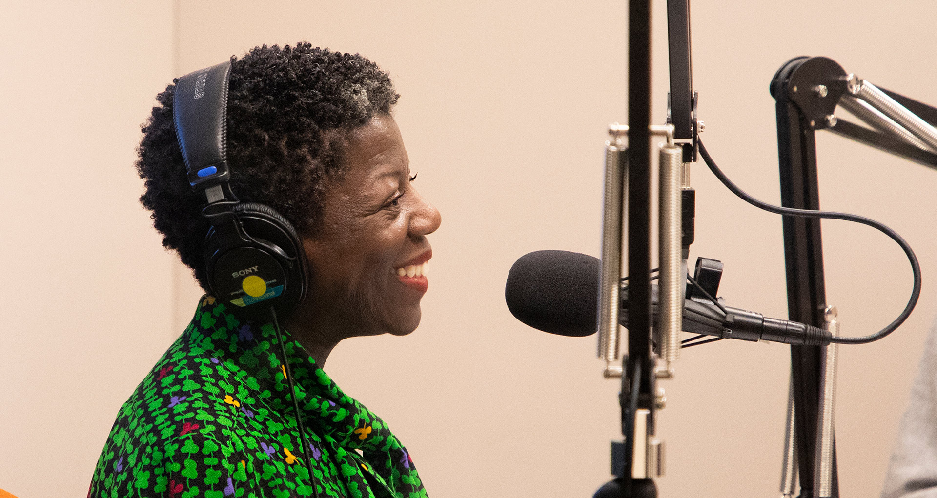 A photo of Thelma Golden recording the David Zwirner podcast in New York, dated 2019.