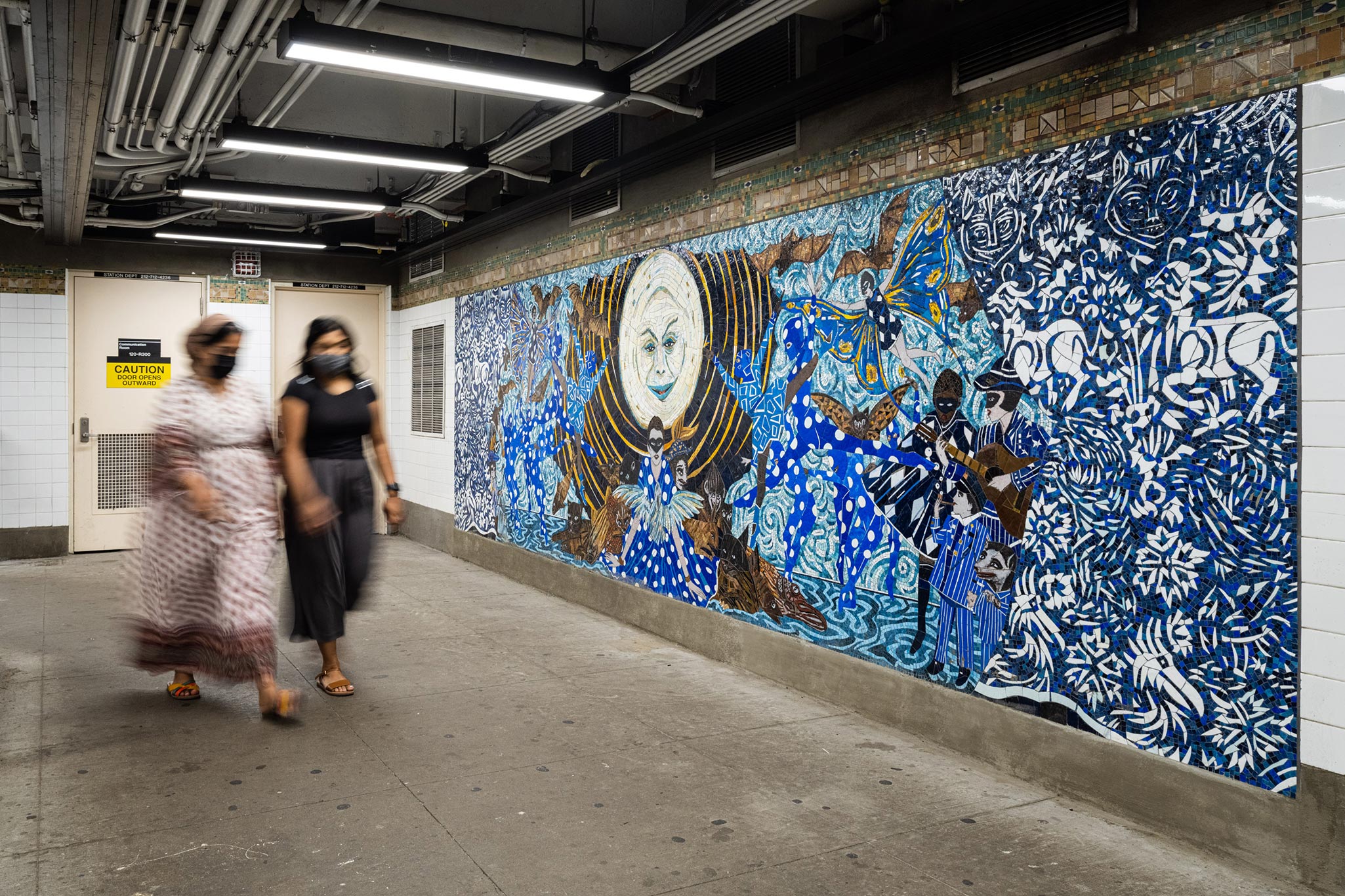 A photo of a mosaic mural by Marcel Dzama, titled No Less Than Everything Comes Together, installed in the subway in New York, in 2021.