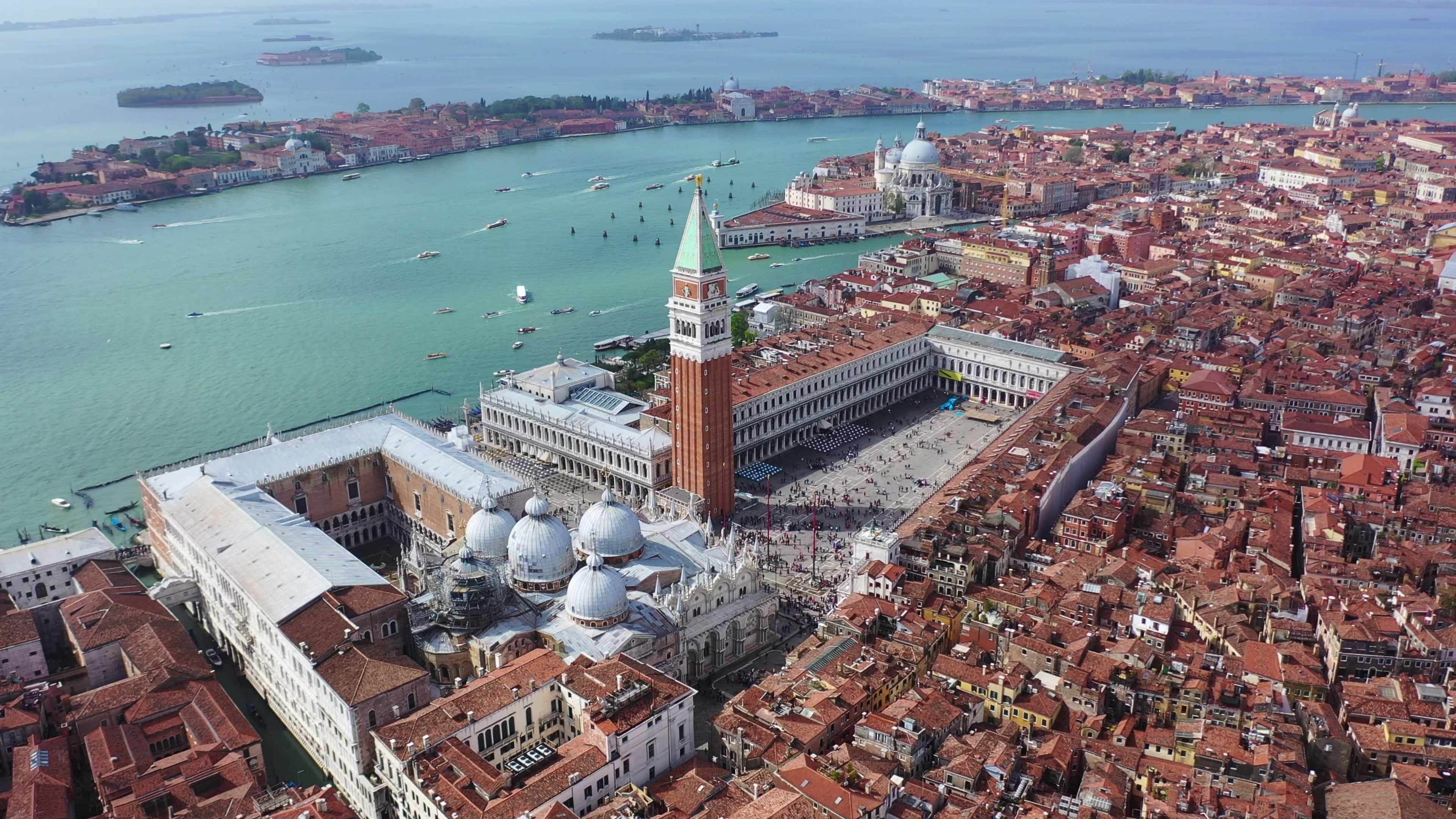 A still from an aerial drone panoramic video of Piazza San Marco featuring Doge's Palace, Basilica and Campanile, Venice, Italy.